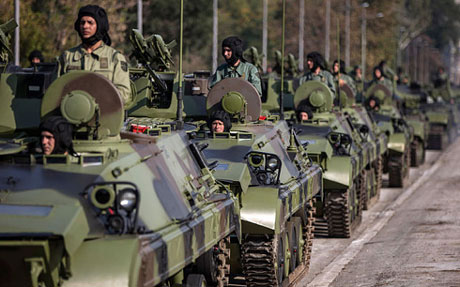 Serbian army soldiers drive tanks during preparations for a military parade in Belgrade Photo: Reuters