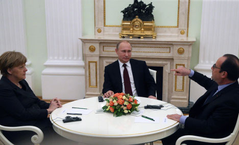 Немачка канцеларка Ангела Меркел и председник Француске Франсоа Оланд најавили су своју посету Кремљу само дан унапред. Извор: Росијска газета